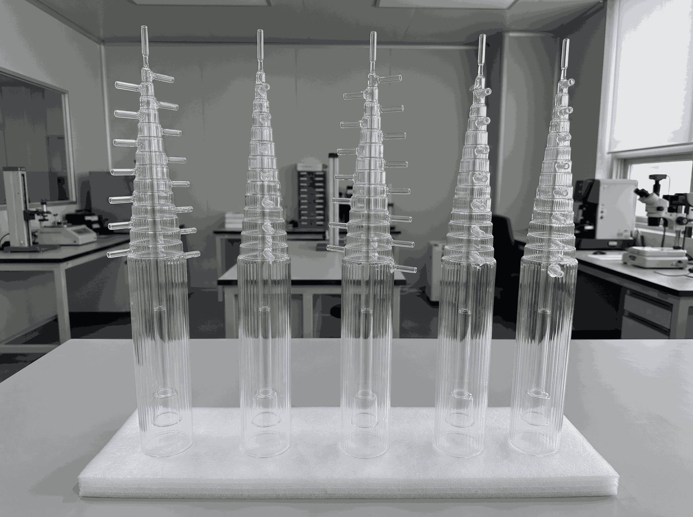 Multi-channel quartz burner configuration for optical fiber preform processing
