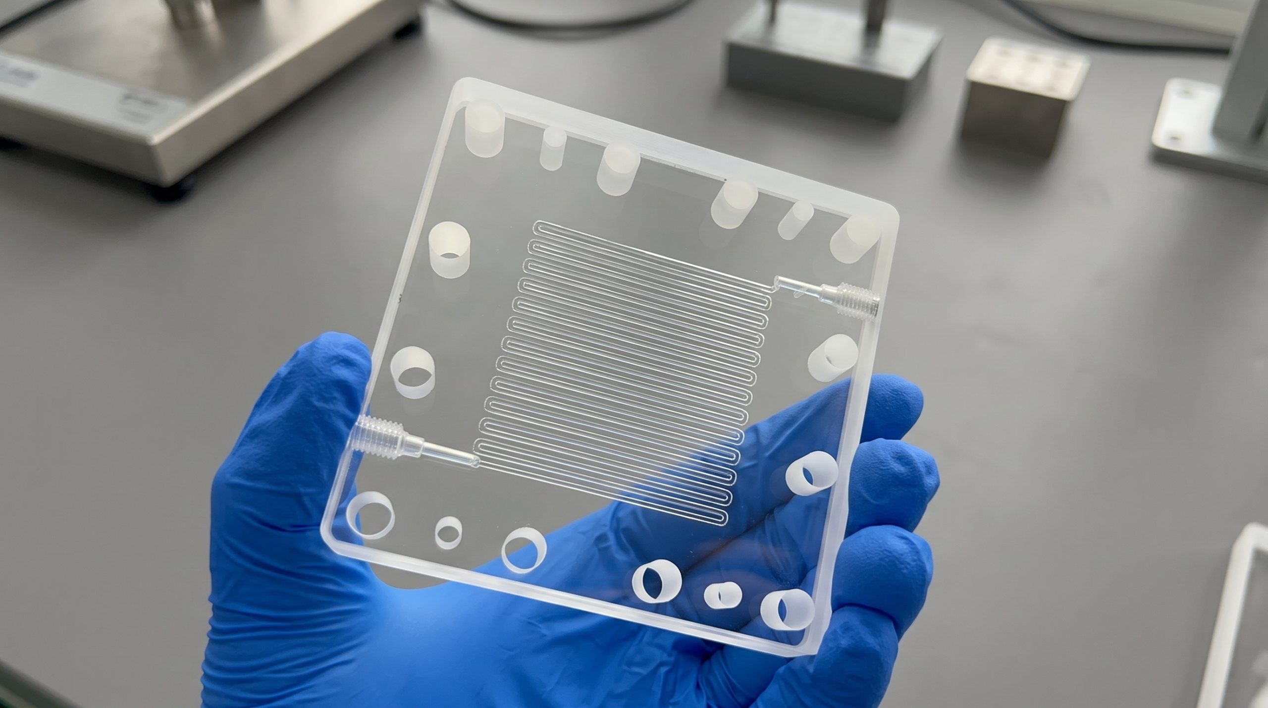 Dimensional inspection of a custom fused quartz component during small-batch manufacturing review